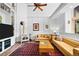 Bright living room featuring white walls, wood stove, and stylish furnishings and decor at 10231 Democrat Rd, Parker, CO 80134