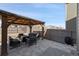 Outdoor gazebo area with patio furniture and a fire pit, perfect for entertaining at 10597 Casper St, Parker, CO 80134