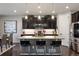 Modern kitchen featuring granite countertops, stainless steel appliances, and ample cabinet space at 10597 Casper St, Parker, CO 80134