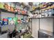 Well-organized pantry with ample shelving, providing plenty of storage space for groceries and kitchen essentials at 10597 Casper St, Parker, CO 80134