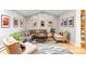 Comfortable living room with a cozy sectional, hardwood floors, and natural light at 1800 S Niagara Way, Denver, CO 80224