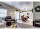 Open-concept kitchen seamlessly connects to the living area, perfect for entertaining with a sliding glass door at 10554 Tracewood Cir, Highlands Ranch, CO 80130