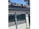 A commercial property with the sign 'Illegal Pete's' and large windows, with outdoor seating at 10185 W 25Th Ave # 31, Lakewood, CO 80215