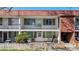 View of a multi-Gathering exterior, with balconies and fenced patios providing private outdoor living spaces at 10185 W 25Th Ave # 31, Lakewood, CO 80215