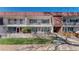 A multi-Gathering building exterior, featuring private patios and balconies in a residential setting at 10185 W 25Th Ave # 31, Lakewood, CO 80215