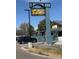 Commercial property with the sign 'Esters' and outdoor seating area, next to a parking area at 10185 W 25Th Ave # 31, Lakewood, CO 80215