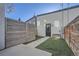 Fenced backyard with artificial turf and private outdoor space at 1439 Garfield St, Denver, CO 80206