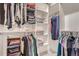 Walk in closet with built-in shelving for ample storage space at 1439 Garfield St, Denver, CO 80206