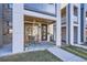 Charming front porch with rocking chairs, creating a welcoming entrance at 1439 Garfield St, Denver, CO 80206
