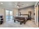 Spacious primary bedroom with a private balcony and ample natural light at 1439 Garfield St, Denver, CO 80206
