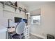 Bright office space with sleek white desk, ample lighting, and street view at 1439 Garfield St, Denver, CO 80206