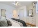 Serene bedroom with hardwood floors, a ceiling fan, and a closet at 1395 S Josephine St, Denver, CO 80210