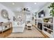 Cozy living room with hardwood floors, a fireplace, and built-in shelving at 1395 S Josephine St, Denver, CO 80210
