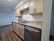 Bright kitchen with stainless steel appliances, granite countertops, and wood cabinets offering lots of storage space at 50 E Highline Cir # 101, Centennial, CO 80122