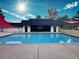 Community pool with a covered lounge area, perfect for relaxation and entertainment at 50 E Highline Cir # 101, Centennial, CO 80122