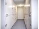 Hallway of well-maintained storage units offering residents secure and convenient storage options at 50 E Highline Cir # 101, Centennial, CO 80122