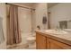 Bathroom with tub, toilet and vanity at 427 S Quay St, Lakewood, CO 80226