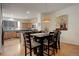 Charming dining area adjacent to a well-equipped kitchen at 427 S Quay St, Lakewood, CO 80226