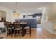 Bright dining room featuring a spacious table with six chairs at 427 S Quay St, Lakewood, CO 80226