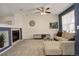 Living room with L-shaped sofa and fireplace at 427 S Quay St, Lakewood, CO 80226