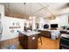 Open concept kitchen with island and living room layout, bright and inviting space at 2261 Blake St # 2G, Denver, CO 80205