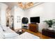 Bright living room with modern decor, large windows and open floor plan, creating an inviting living space at 2261 Blake St # 2G, Denver, CO 80205