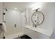Stylish bathroom featuring walk-in shower, sleek fixtures, and modern design at 2120 N Downing St # 209, Denver, CO 80205