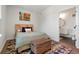 Charming bedroom with adjacent bathroom access at 2120 N Downing St # 209, Denver, CO 80205