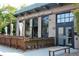 White Pie restaurant displaying a modern facade with large windows and inviting outdoor seating at 2120 N Downing St # 209, Denver, CO 80205