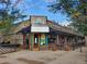 Charming restaurant with outdoor seating and unique architectural details on a sunny day at 2120 N Downing St # 209, Denver, CO 80205