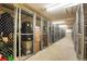A hallway of secured storage units providing residents with ample space for their belongings at 2120 N Downing St # 209, Denver, CO 80205