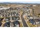 Aerial view of the neighborhood showcasing new homes and street layouts in a community setting at 2754 W 69Th Ave, Denver, CO 80221