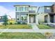 This inviting two-story residence boasts a modern design, a manicured lawn, and a charming front entrance at 2754 W 69Th Ave, Denver, CO 80221