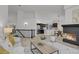 Spacious and open living area showing the kitchen and dining area. Brightly lit and very modern at 1894 S Marshall Cir, Lakewood, CO 80232