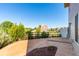 Cozy back yard with concrete patio, lush landscaping and fencing at 19060 E 54Th Pl, Denver, CO 80249