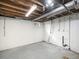 Unfinished basement space with concrete floor and exposed ceiling at 8901 Field St # 81, Broomfield, CO 80021
