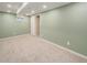 Spacious basement area featuring wall-to-wall carpet, neutral paint and multiple electrical outlets at 8901 Field St # 81, Broomfield, CO 80021