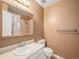 Well-maintained bathroom featuring vanity with decorative mirror and a tiled shower at 8901 Field St # 81, Broomfield, CO 80021