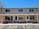 Charming condo exterior featuring well-maintained siding, white trim, and inviting front entrances at 8901 Field St # 81, Broomfield, CO 80021