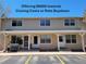 Inviting townhouse featuring a well-maintained facade and convenient parking at 8901 Field St # 81, Broomfield, CO 80021