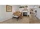 Carpeted living area with white brick fireplace and a vintage piano at 9662 Newcastle Dr, Highlands Ranch, CO 80130