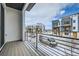 Private balcony overlooking community with snowy street view at 780 Josephine Way, Superior, CO 80027