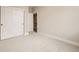 Bright bedroom with plush carpeting and double-door closet at 780 Josephine Way, Superior, CO 80027