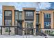 Modern three-story townhome with sleek design and neutral color palette at 780 Josephine Way, Superior, CO 80027