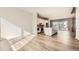 Modern kitchen with white cabinets, island, and stainless steel appliances at 780 Josephine Way, Superior, CO 80027