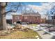 Brick home with fenced backyard and patio at 2895 Dexter St, Denver, CO 80207