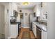 Bright kitchen offers stainless steel appliances and granite countertops at 2895 Dexter St, Denver, CO 80207