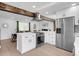 Modern kitchen with stainless steel appliances and an open concept design at 1517 S Elkhart St, Aurora, CO 80012