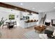 Open concept living and dining area with stainless steel appliances at 1517 S Elkhart St, Aurora, CO 80012