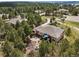 Beautiful property with a rear patio, fire pit area, lush trees, and peaceful surroundings at 20413 Bald Mountain Ct, Monument, CO 80132